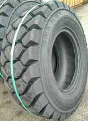 Шини на навантажувачі Bobcat,  Сase,  Komatsu,  UNC:R12, 15, 15.3, 16.5, 17.5